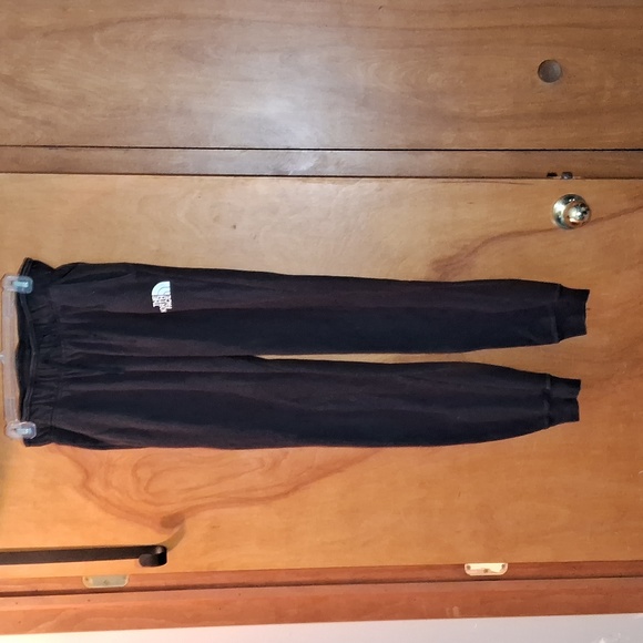The North Face woman's size medium black sweat pants with elastic waist - Picture 1 of 5